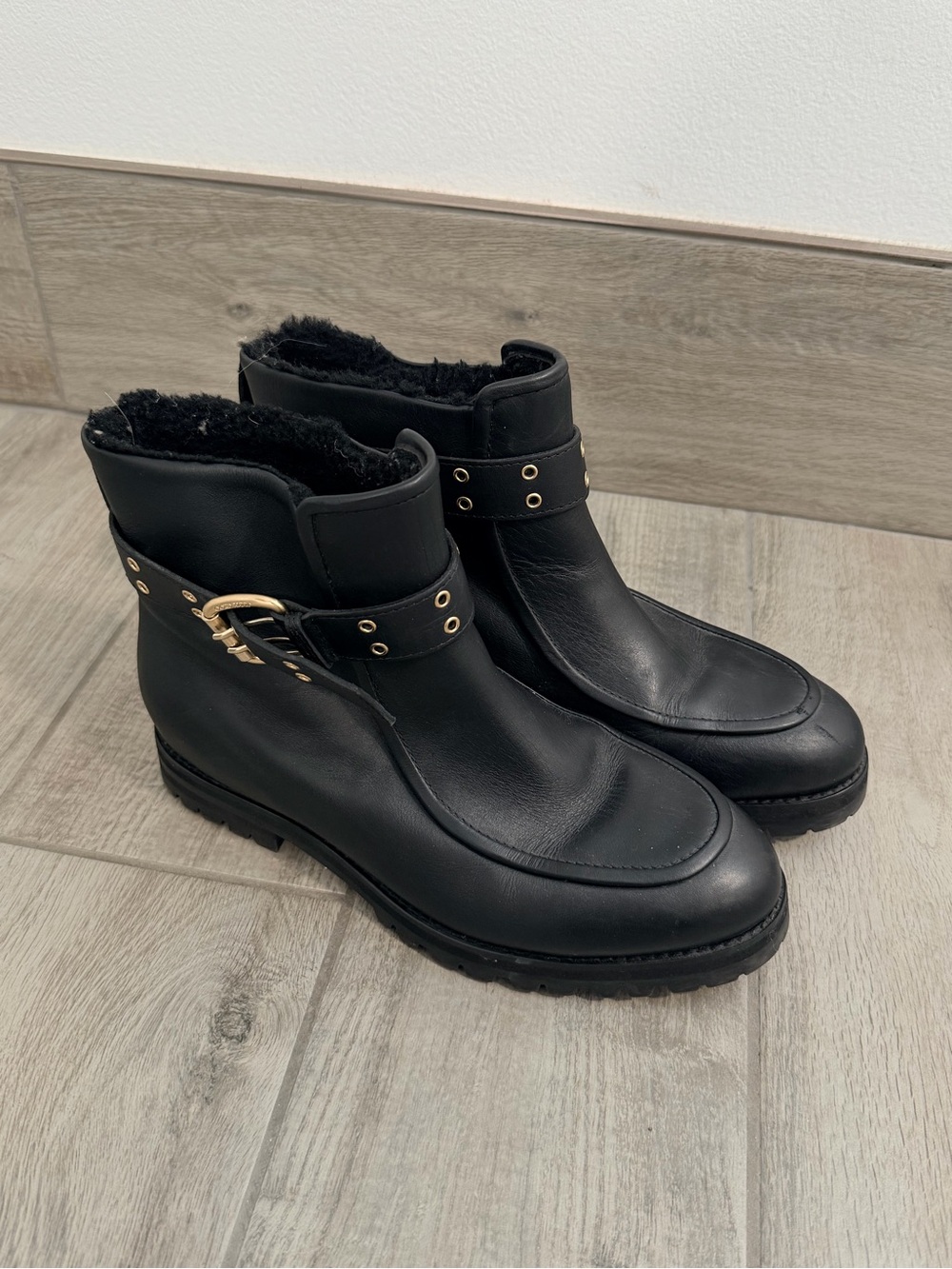 Jimmy Choo Black Leather Ankle Boots with Gold Buckle